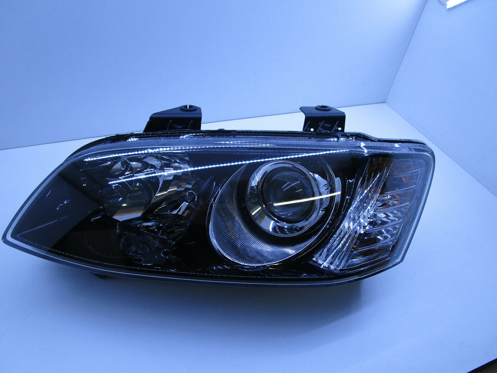 Headlight Black Projector LEFT fits Holden Commodore VE SSV Calais 2010 - 2013