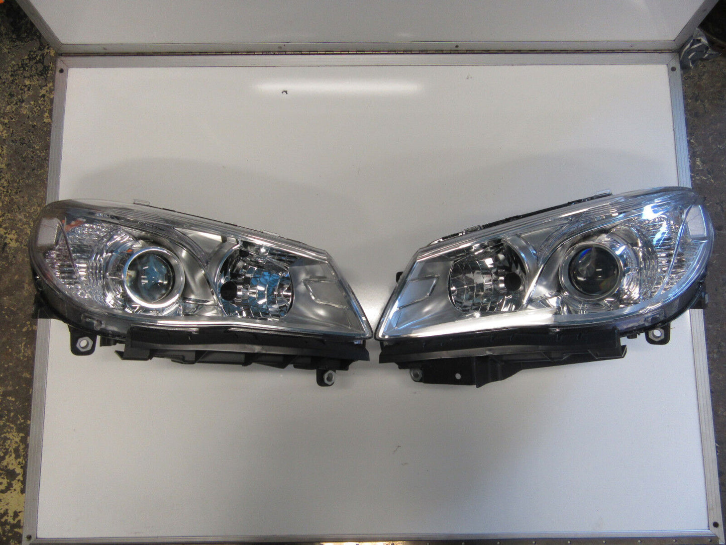 HOLDEN COMMODORE VF 2013-2018 EVOKE HEADLIGHTS PAIR LEFT AND RIGHT NEW CHROME