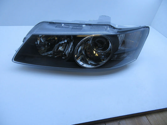 HOLDEN COMMODORE VY  CALAIS BLACK HEADLIGHT HEAD LAMP DRIVER SIDE PROJECTOR