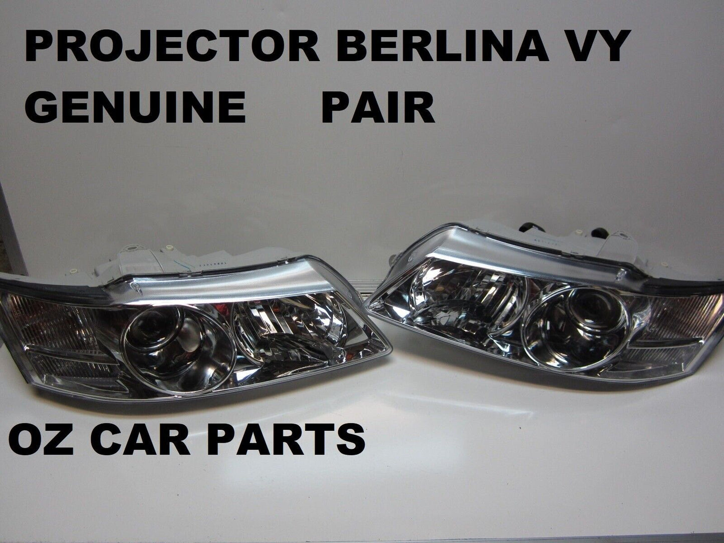 GENUINE HOLDEN COMMODORE VY BERLINA PROJECTOR HEADLIGHTS HEAD LAMPS PAIR NEW