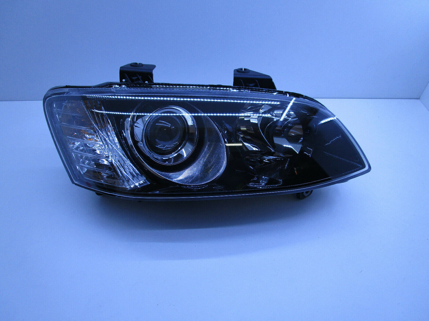 SSV CALAIS HEADLIGHT PROJECTOR HOLDEN COMMODORE VE SERIES 2 DRIVER SIDE GENUINE