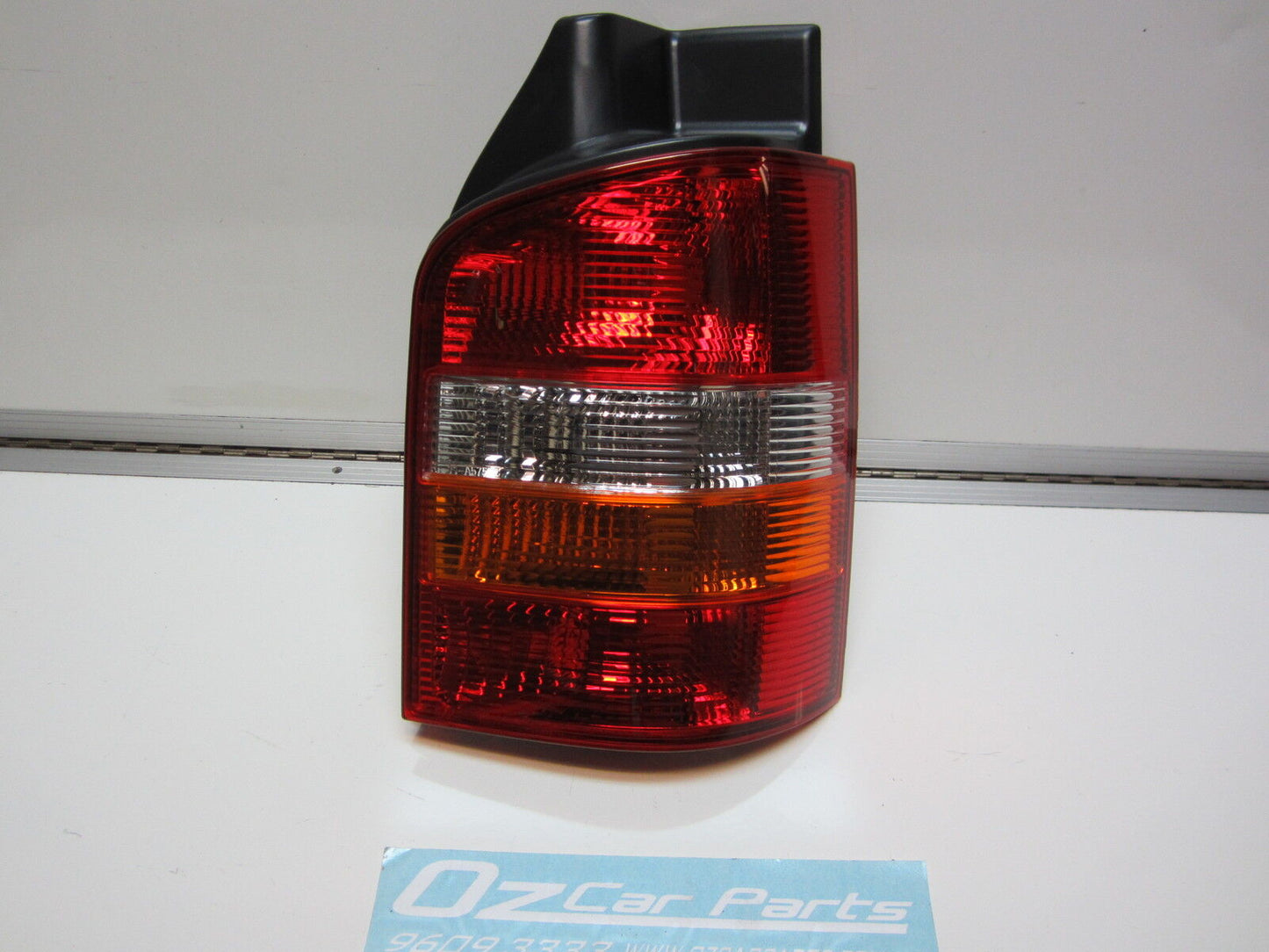 DRIVER SIDE TAIL LIGHT FOR VOLKSWAGEN TRANSPORTER T5 08/2004-ON SWING DOOR