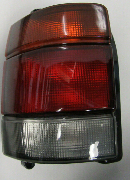 HOLDEN COMMODORE VR VS UTE WAGON SMOKEY/ TINTED TAIL LIGHT RIGHT HAND NEW