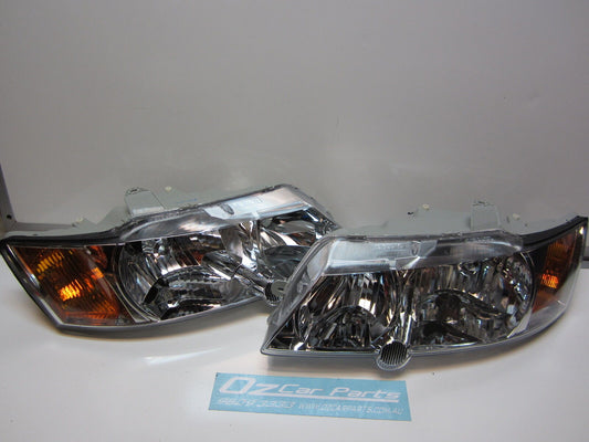 HOLDEN COMMODORE VY HEADLIGHTS HEAD LAMPS PAIR DRIVER &PASSENGER SIDE ORANGE