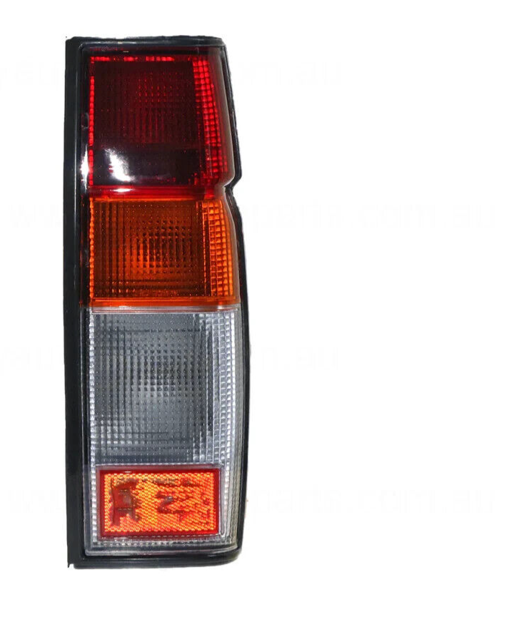 NEW RED/AMBER/CLEAR TAIL LAMP DRIVERS SIDE FOR NISSAN NAVARA 6/1992-3/1997