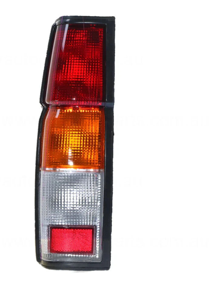 NEW RED/AMBER/CLEAR TAIL LAMP PASSENGERS SIDE FOR NISSAN NAVARA 6/1992-3/1997