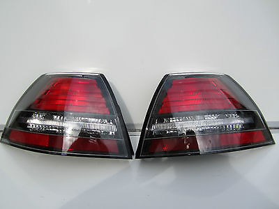 HOLDEN COMMODORE VE CALAIS TAIL LIGHTS BRAND NEW pair LEFT AND RIGHT SIDE NEW